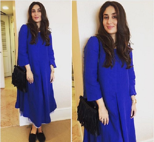 A royal blue dress with black accessories looks gorgeous on Bebo