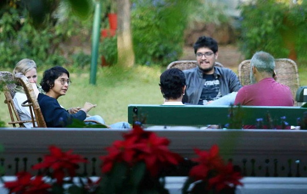 Junaid Khan, Aamir Khan and Kiran Rao seen chatting with their friends in the garden