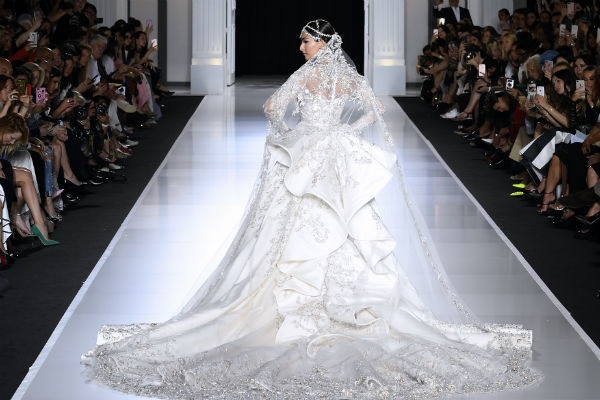 Sonam flaunts the long embellished train of her Ralph &amp; Russo bridal gown